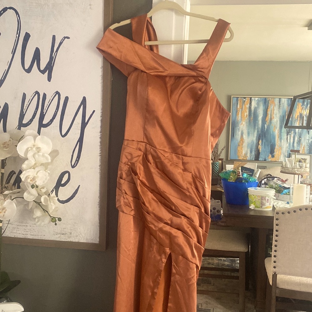 Size 8 dress. It has never been worn, I just took it out of the bag to post.